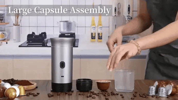 Portable Espresso Maker with capsule components for ground coffee and small capsule brewing options