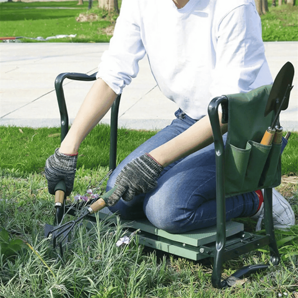 Person using a garden kneeler with gardening tools on grass