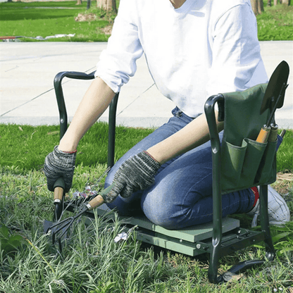 Person using a garden kneeler with gardening tools on grass